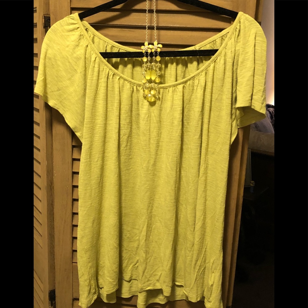 Very vibrant lime green blouse.